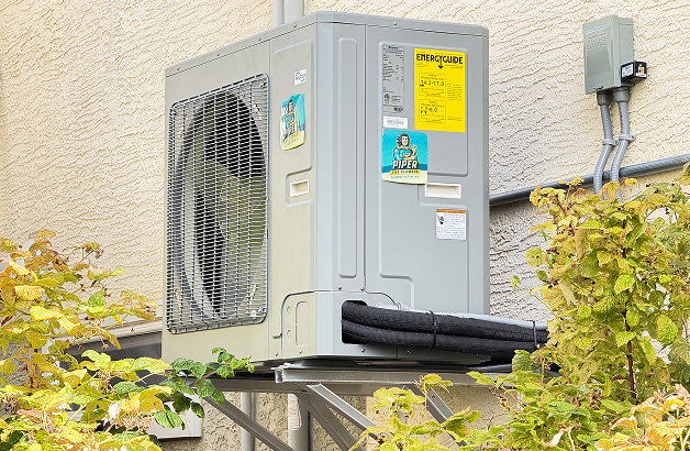 Professional heat pump setup in Red Deer home by Piper the Plumber